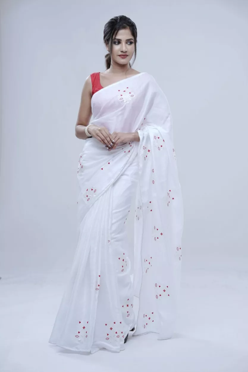 White stone embroidered organza saree with embroidery motifs, scallop  border of intricate crystal stone work